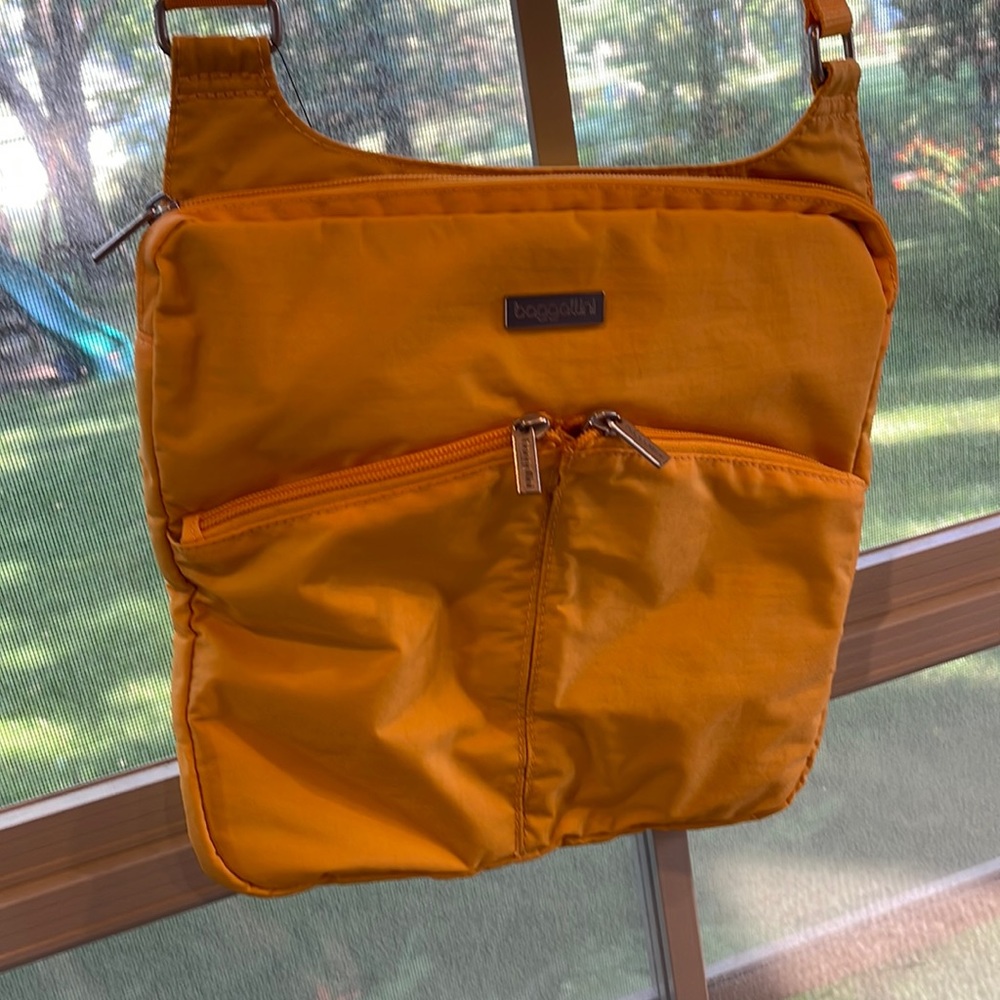 Baggalini canyon crossbody NWT marigold yellow
